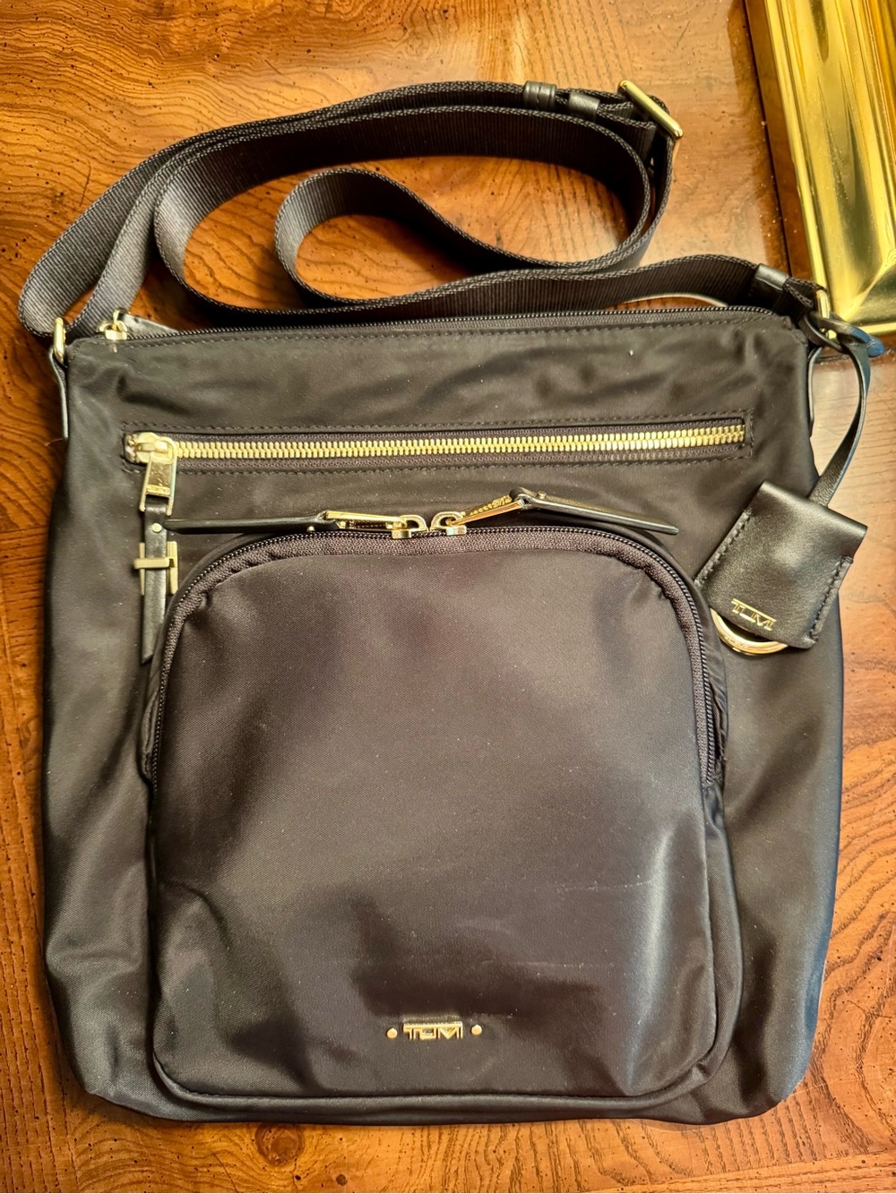 Tumi Black Nylon Crossbody Bag with Gold Hardware